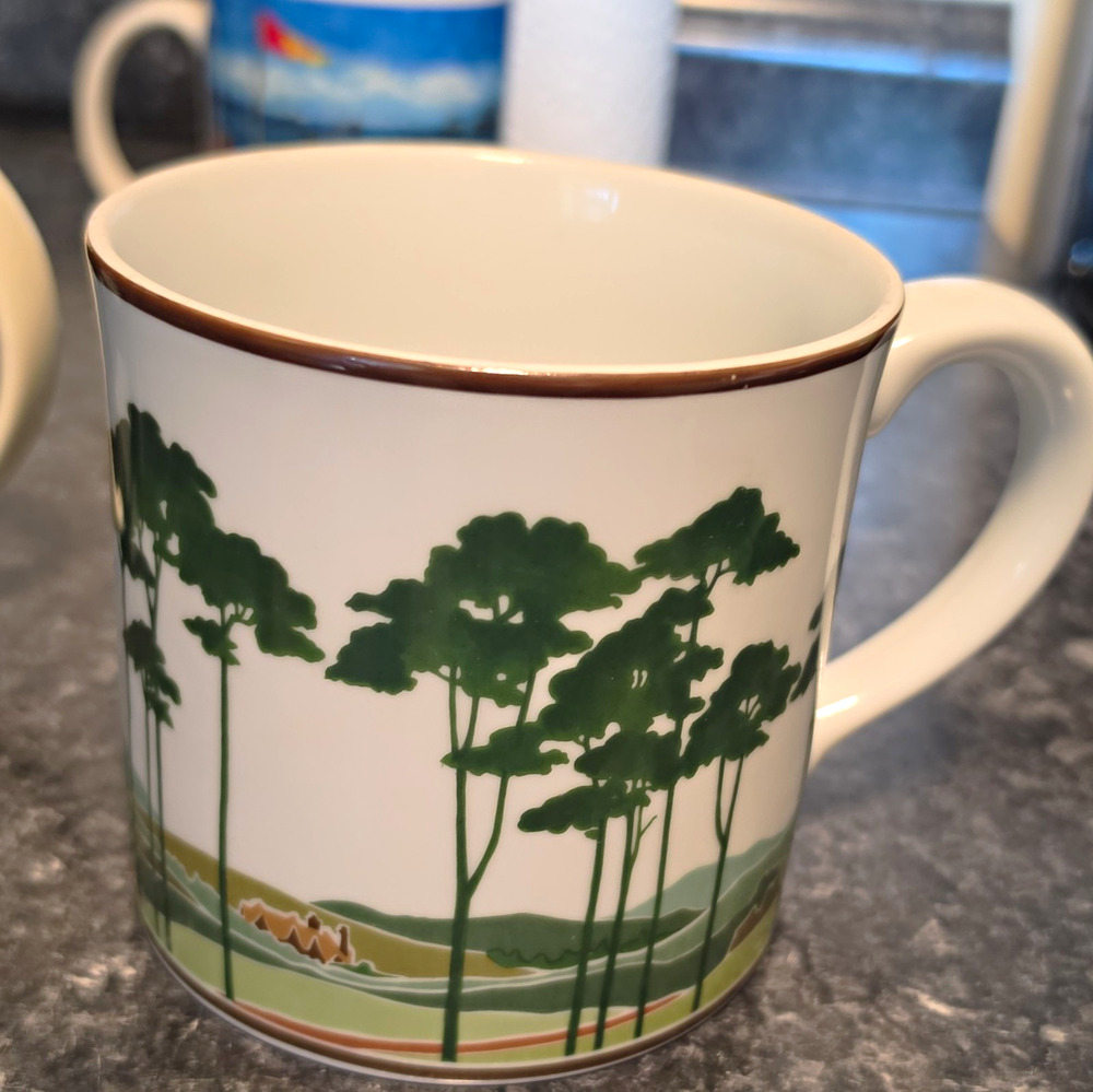Aramis Devin Ceramic Coffee Mug 20 fl oz White Green Landscape Brown Rim
